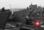 Image of Loading Allied landing craft  for D-Day invasion of France England United Kingdom, 1944, second 11 stock footage video 65675069838