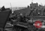 Image of Loading Allied landing craft  for D-Day invasion of France England United Kingdom, 1944, second 13 stock footage video 65675069838