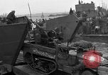 Image of Loading Allied landing craft  for D-Day invasion of France England United Kingdom, 1944, second 15 stock footage video 65675069838
