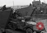 Image of Loading Allied landing craft  for D-Day invasion of France England United Kingdom, 1944, second 17 stock footage video 65675069838