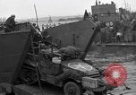 Image of Loading Allied landing craft  for D-Day invasion of France England United Kingdom, 1944, second 18 stock footage video 65675069838