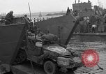 Image of Loading Allied landing craft  for D-Day invasion of France England United Kingdom, 1944, second 19 stock footage video 65675069838