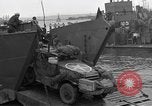 Image of Loading Allied landing craft  for D-Day invasion of France England United Kingdom, 1944, second 21 stock footage video 65675069838