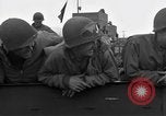 Image of Loading Allied landing craft  for D-Day invasion of France England United Kingdom, 1944, second 27 stock footage video 65675069838