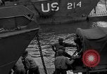 Image of Loading Allied landing craft  for D-Day invasion of France England United Kingdom, 1944, second 36 stock footage video 65675069838