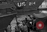 Image of Loading Allied landing craft  for D-Day invasion of France England United Kingdom, 1944, second 38 stock footage video 65675069838