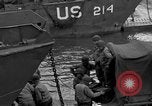 Image of Loading Allied landing craft  for D-Day invasion of France England United Kingdom, 1944, second 42 stock footage video 65675069838