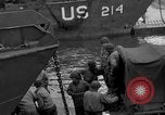 Image of Loading Allied landing craft  for D-Day invasion of France England United Kingdom, 1944, second 43 stock footage video 65675069838