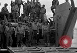Image of Loading Allied landing craft  for D-Day invasion of France England United Kingdom, 1944, second 44 stock footage video 65675069838