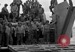 Image of Loading Allied landing craft  for D-Day invasion of France England United Kingdom, 1944, second 47 stock footage video 65675069838