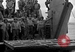 Image of Loading Allied landing craft  for D-Day invasion of France England United Kingdom, 1944, second 49 stock footage video 65675069838