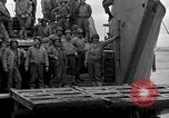 Image of Loading Allied landing craft  for D-Day invasion of France England United Kingdom, 1944, second 50 stock footage video 65675069838
