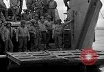 Image of Loading Allied landing craft  for D-Day invasion of France England United Kingdom, 1944, second 52 stock footage video 65675069838