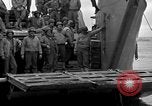 Image of Loading Allied landing craft  for D-Day invasion of France England United Kingdom, 1944, second 53 stock footage video 65675069838