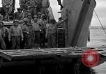 Image of Loading Allied landing craft  for D-Day invasion of France England United Kingdom, 1944, second 55 stock footage video 65675069838