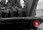 Image of Loading Allied landing craft  for D-Day invasion of France England United Kingdom, 1944, second 57 stock footage video 65675069838