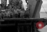 Image of Loading Allied landing craft  for D-Day invasion of France England United Kingdom, 1944, second 59 stock footage video 65675069838