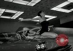 Standbild 1956 National Automobile Show New York United States USA, 1956, aus Sekunde 19 historischem Filmmaterial Videoclip 65675069880