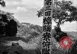 Standbild Dampflokomotive ein Zug nach hinten schieben Taiwan, 1940, aus Sekunde 28 historischem Filmmaterial Videoclip 65675069924