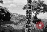 Standbild Dampflokomotive ein Zug nach hinten schieben Taiwan, 1940, aus Sekunde 30 historischem Filmmaterial Videoclip 65675069924