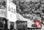 Standbild Dampflokomotive ein Zug nach hinten schieben Taiwan, 1940, aus Sekunde 46 historischem Filmmaterial Videoclip 65675069924