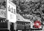 Standbild Dampflokomotive ein Zug nach hinten schieben Taiwan, 1940, aus Sekunde 47 historischem Filmmaterial Videoclip 65675069924
