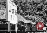 Standbild Dampflokomotive ein Zug nach hinten schieben Taiwan, 1940, aus Sekunde 49 historischem Filmmaterial Videoclip 65675069924