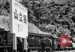 Standbild Dampflokomotive ein Zug nach hinten schieben Taiwan, 1940, aus Sekunde 52 historischem Filmmaterial Videoclip 65675069924