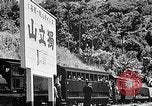 Standbild Dampflokomotive ein Zug nach hinten schieben Taiwan, 1940, aus Sekunde 53 historischem Filmmaterial Videoclip 65675069924
