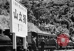 Standbild Dampflokomotive ein Zug nach hinten schieben Taiwan, 1940, aus Sekunde 54 historischem Filmmaterial Videoclip 65675069924