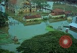 Immagine di Il fiume Mekong inondazioni città di Chau Doc in Vietnam durante la Guerra del Vietnam Chau Doc Vietnam del Sud, 1966, secondo 11 filmato di repertorio 65675069969