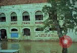 Immagine di Il fiume Mekong inondazioni città di Chau Doc in Vietnam durante la Guerra del Vietnam Chau Doc Vietnam del Sud, 1966, secondo 36 filmato di repertorio 65675069969