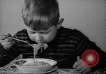 Image of pet crow Chicago Illinois USA, 1939, second 8 stock footage video 65675070058