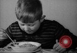 Image of pet crow Chicago Illinois USA, 1939, second 9 stock footage video 65675070058