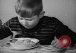 Image of pet crow Chicago Illinois USA, 1939, second 25 stock footage video 65675070058