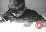 Image of pet crow Chicago Illinois USA, 1939, second 26 stock footage video 65675070058