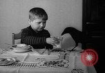 Image of pet crow Chicago Illinois USA, 1939, second 32 stock footage video 65675070058