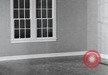 Image of remodeled living room United States USA, 1935, second 58 stock footage video 65675070080