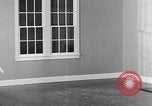 Image of remodeled living room United States USA, 1935, second 59 stock footage video 65675070080
