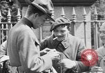 Image of U.S. soldiers and French people in World War I Brest France, 1918, second 40 stock footage video 65675070086