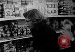 Image of bare shelves at supermarket United States USA, 1962, second 15 stock footage video 65675070172