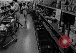 Image of bare shelves at supermarket United States USA, 1962, second 18 stock footage video 65675070172