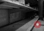 Image of bare shelves at supermarket United States USA, 1962, second 32 stock footage video 65675070172