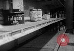 Image of bare shelves at supermarket United States USA, 1962, second 33 stock footage video 65675070172