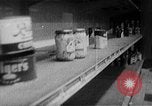 Image of bare shelves at supermarket United States USA, 1962, second 34 stock footage video 65675070172
