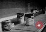 Image of bare shelves at supermarket United States USA, 1962, second 37 stock footage video 65675070172