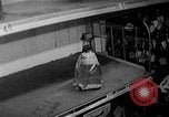 Image of bare shelves at supermarket United States USA, 1962, second 38 stock footage video 65675070172