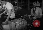 Image of bare shelves at supermarket United States USA, 1962, second 42 stock footage video 65675070172