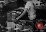 Image of bare shelves at supermarket United States USA, 1962, second 43 stock footage video 65675070172