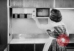 Image of modern kitchen New York City USA, 1954, second 57 stock footage video 65675070193